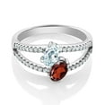 thumbnail image 2 of Gem Stone King 1.48 Ct Oval Sky Blue Aquamarine Red Garnet 925 Sterling Silver Ring (Size 5), 2 of 4