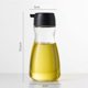 thumbnail image 1 of Botella dispensadora de aceite de sésamo de vidrio con control de volumen, perfecta for condimentar y cocinar, 1 of 2