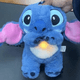 thumbnail image 1 of Muñeco de peluche con luz LED y música auténtica de Stitch Breathe, figura de acción de Lilo Stitch para bebé, juguete de regalo para acompañarlo mientras duerme, 1 of 5