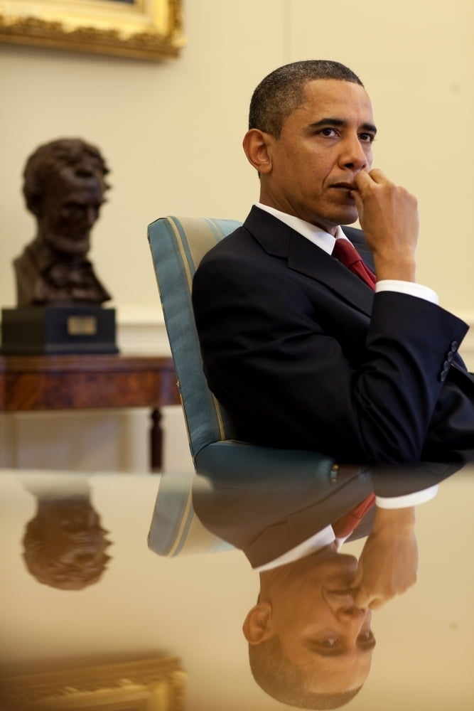 President Barack Obama Listens To His Senior Advisors During An Oval Office Meeting Jan 25