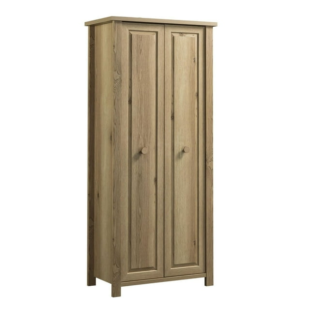 Sauder Hillmont Farm Storage Cabinet in timber oak finish with two paneled doors and round wooden knobs
