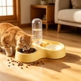 thumbnail image 1 of Dispensador automático de agua y comida 2 en 1 para perros y gatos: comedero doble con cuencos de acero inoxidable, base antideslizante, reposición de agua por gravedad y soporte para comida seca., 1 of 6