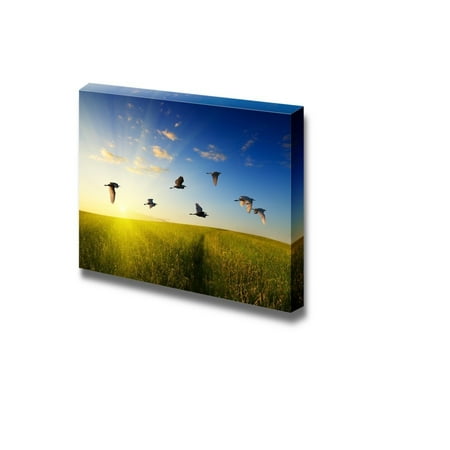 Away Wall Art - Wall26 - Canvas Prints Wall Art - A Flock of Birds Flying Away in the Sunrise | Modern Wall Decor/ Home Decoration Stretched Gallery Canvas Wrap Giclee Print. Ready to Hang - 16