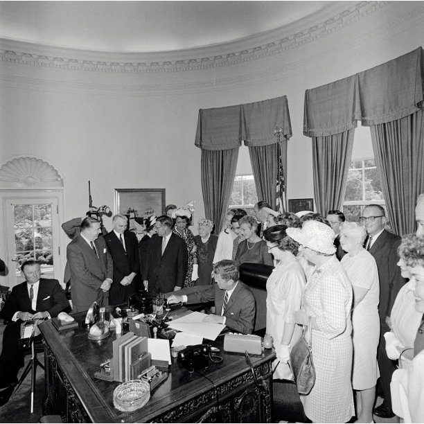 President John F Kennedy signing the Equal Pay Act Poster Print by