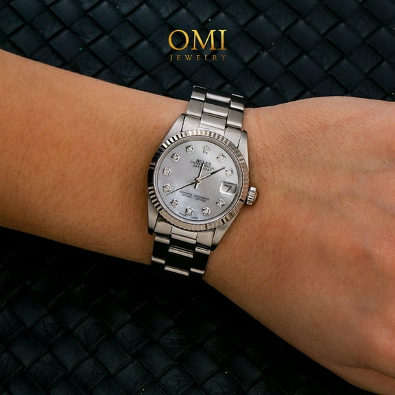 Pre-Owned Rolex Datejust 31MM 68241 Silver Diamond Dial Fluted Bezel Stainless Steel Oyster Bracelet