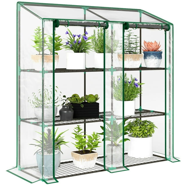 Outsunny Mini Greenhouse avec 3 Niveaux 6 Tablettes Portable Green House, Clair. Cette Serre Compacte Présente une Conception à Trois Niveaux avec six Tablettes Grillagées, Offrant un Grand Espace pour Organiser les Plantes. la Housse en Plastique Transparent avec Deux Portes Enroulables Assure un Contrôle optimal de la Température et de l'Humidité Tout en Permettant un Accès Facile et une ventilation. le Toit en pent Empêche l'Accumulation d'Eau, et la Housse Surdimensionnée Peut Être Enfouie pour une Stabilité Accrue. Fabriquée en Acier et Plastique, Elle Mesure 56,3 Pouces de Large, 18