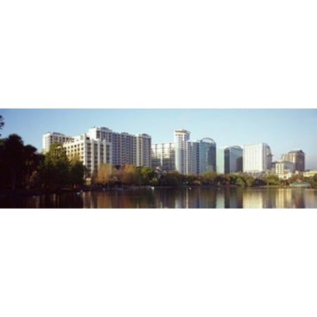 Buildings at the waterfront Lake Eola Orlando Orange County Florida USA Canvas Art - Panoramic Images (18 x