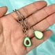 thumbnail image 4 of llaveros de aguacate con colgante de arcilla, regalo para parejas, ovalados, sin núcleo, estilo aleatorio., 4 of 5
