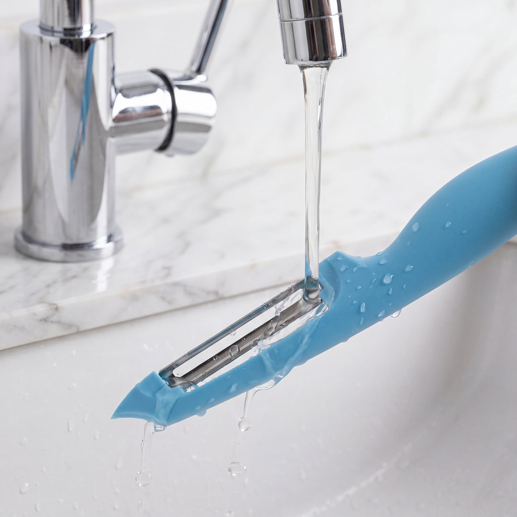 Unique Bargains Plastic Vegetable Peeler with Ergonomic Handle for Peeling Blue 7.3x1 inch