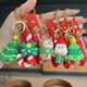 thumbnail image 3 of JM LLavero de Navidad de goma, llavero de Papá Noel con tema navideño, regalo de dibujos animados, llavero para bolso, 1 ud. JM, 3 of 3