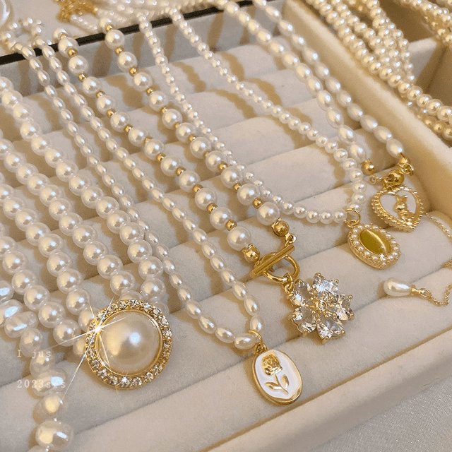 Collar retro con forma de ojo de gato con perlas incrustadas de diamantes, cadena de clavícula de lujo ligera y moderna, collar de alta calidad para mujer