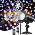 thumbnail image 1 of Outdoor LED Christmas Projector, Snowflake Lamp for Indoor and Outdoor Use, IP65 Waterproof with Remote Control., 1 of 5