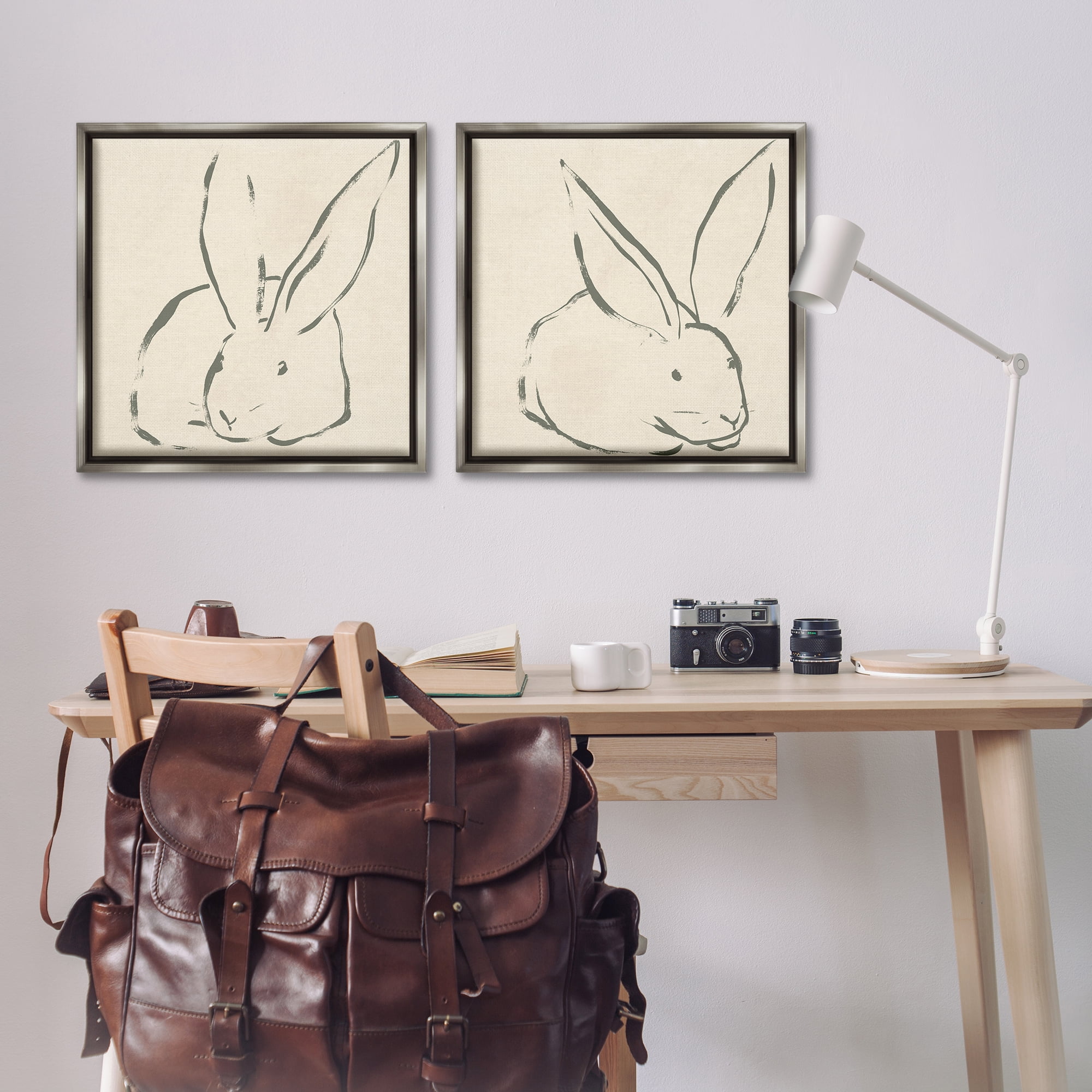 Stupell Industries Minimalist Resting Rabbit Line Drawing Animals Drawing Gray Floater Framed Canvas Art Print Wall Art, 25 x 25, Set of 2