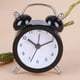 thumbnail image 3 of Mini reloj de alarma de metal para niños de escritorio redondo con número de marcación de dibujos animados (negro) Likrtyny Libre de BPA, 3 of 9