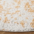 thumbnail image 3 of SAFAVIEH Rumi Derek Abstract Polyester Shag Area Rug, Gold/Ivory, 6'7" x 6'7" Round, 3 of 10
