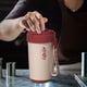 thumbnail image 4 of Taza de café térmica de acero inoxidable con asa | 24 horas de frío y 12 horas de calor | Tapa abatible antigoteo | Portátil para viajes, oficina, gimnasio y senderismo, 4 of 6