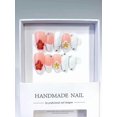thumbnail image 1 of Uñas postizas largas almendradas color melocotón y blanco con punta francesa, pedrería y diseño floral en 3D., 1 of 5