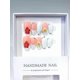 thumbnail image 1 of Uñas postizas largas almendradas color melocotón y blanco con punta francesa, pedrería y diseño floral en 3D., 1 of 5