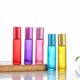 thumbnail image 1 of Botella con bola de rodillo de vidrio de color de 5 ml y 10 ml, botella con cuentas a prueba de luz Mengsha, botella con rociador de perfume, aceite esencial, 1 of 2