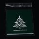 thumbnail image 1 of Bolsas de celofán rectangulares OPP con diseño de árbol de Navidad, color verde oscuro, 14 x 9,9 cm. Grosor: 0,035 mm. Medidas interiores: 11 x 9,9 cm. 95-100 unidades por bolsa., 1 of 3