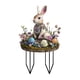 thumbnail image 2 of Huevos y conejitos de Pascua de colores insertados en el suelo, 2 of 5