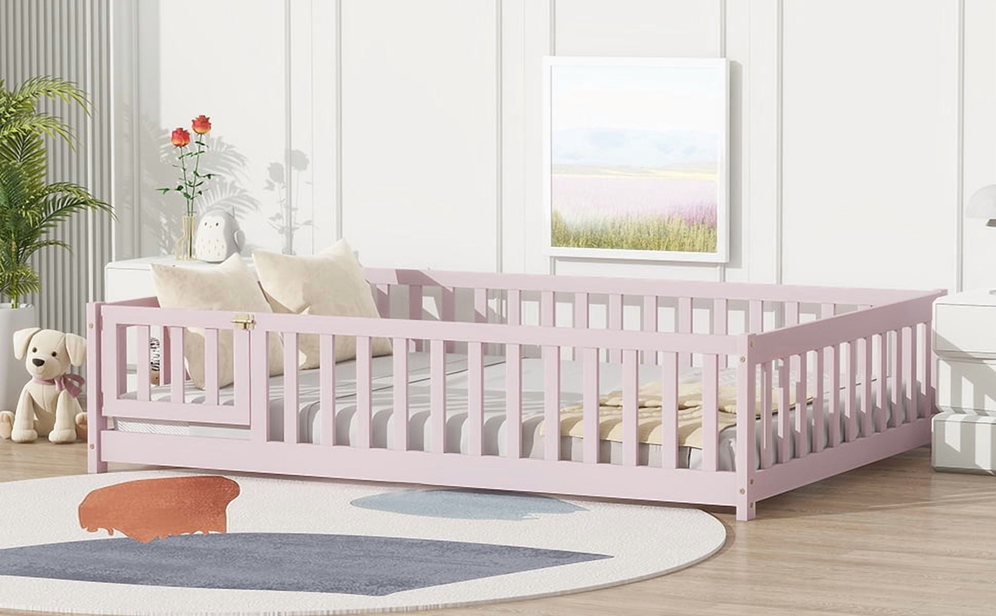 Full Size Rubber Wood Floor Bed with Fence and Door, Pink Safety Guardrails Kids Platform Bed, 7 Slats Support No Box Spring Needed for Compact Bedroom