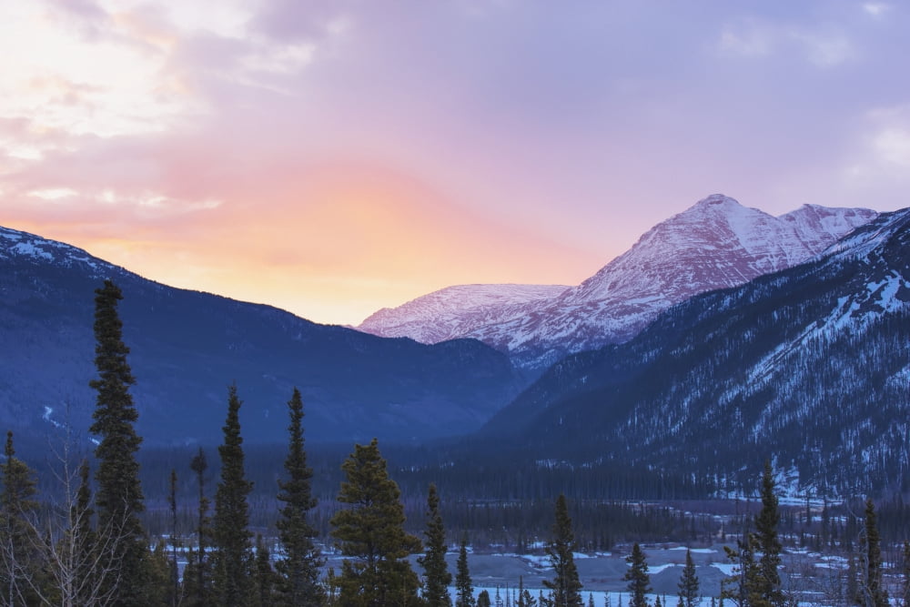 Sunrise Lights The Clouds Pink Above The Sentinel Range Along The Alcan Highway Muncho Lake Provincial Park Northern Canadian Rockies Early Spring Northern British Columbia Canada Canvas Art - Kevin S