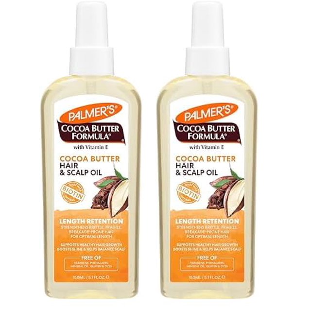 aceite para cabello y cuero cabelludo manteca de cacao y biotina palmer's 150 ml x2 Paquete de dos botellas frontales, vista centrada y de frente; frascos translúcidos con dosificador y líquido dorado, etiquetas naranja y marrón con logotipo Palmer's, texto Cocoa Butter Formula y sello de biotina; indicado para hidratación y fortificante del cabello, a menudo usado para masajes ligeros del cuero cabelludo.