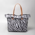 thumbnail image 1 of Bolso Hombro para Mujer Con Diario Lona Borlas (estampado Cebra), 1 of 5