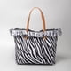 thumbnail image 1 of Bolso Hombro para Mujer Con Diario Lona Borlas (estampado Cebra), 1 of 5