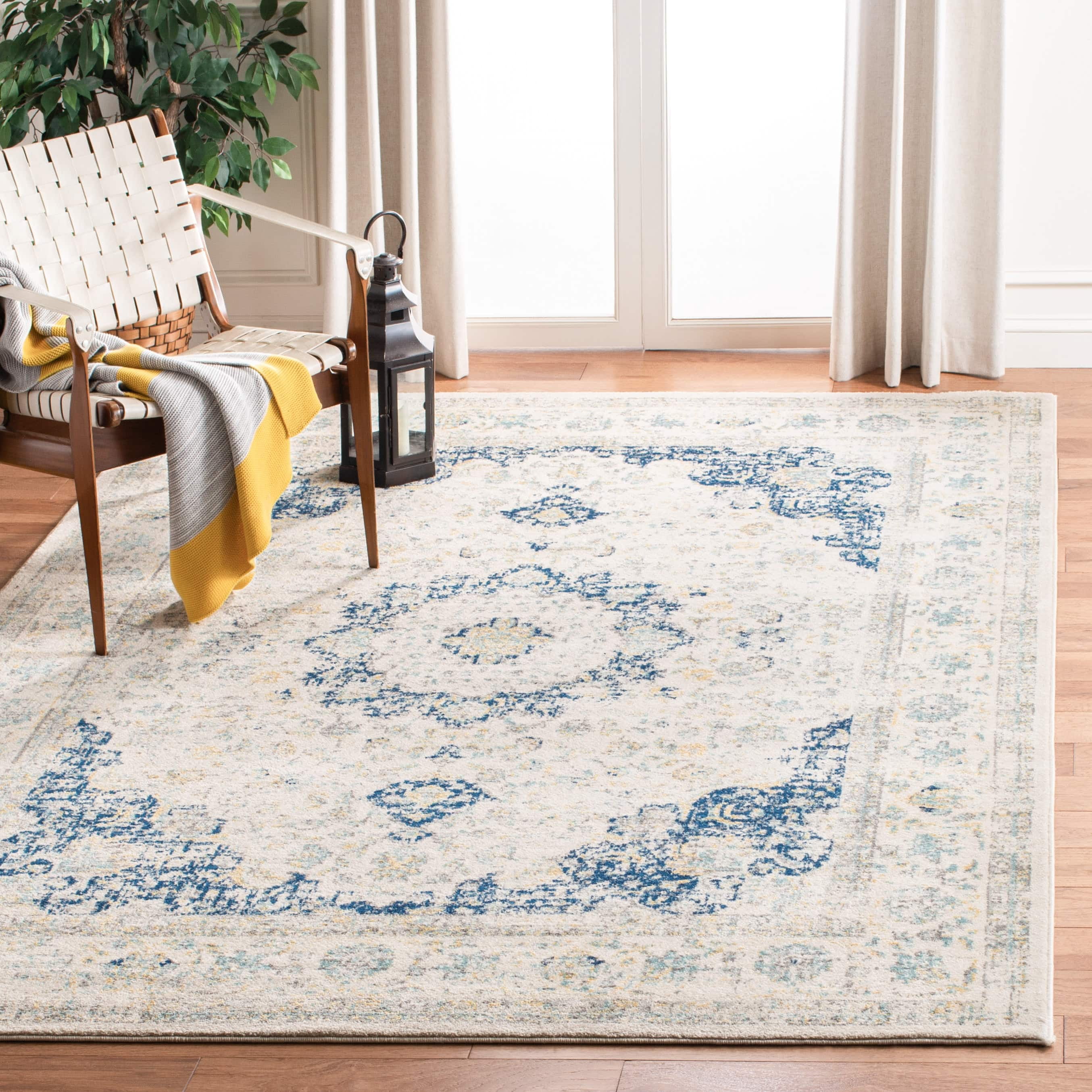 SAFAVIEH Evoke Teale Bordered Area Rug, Ivory/Blue, 12' x 18'
