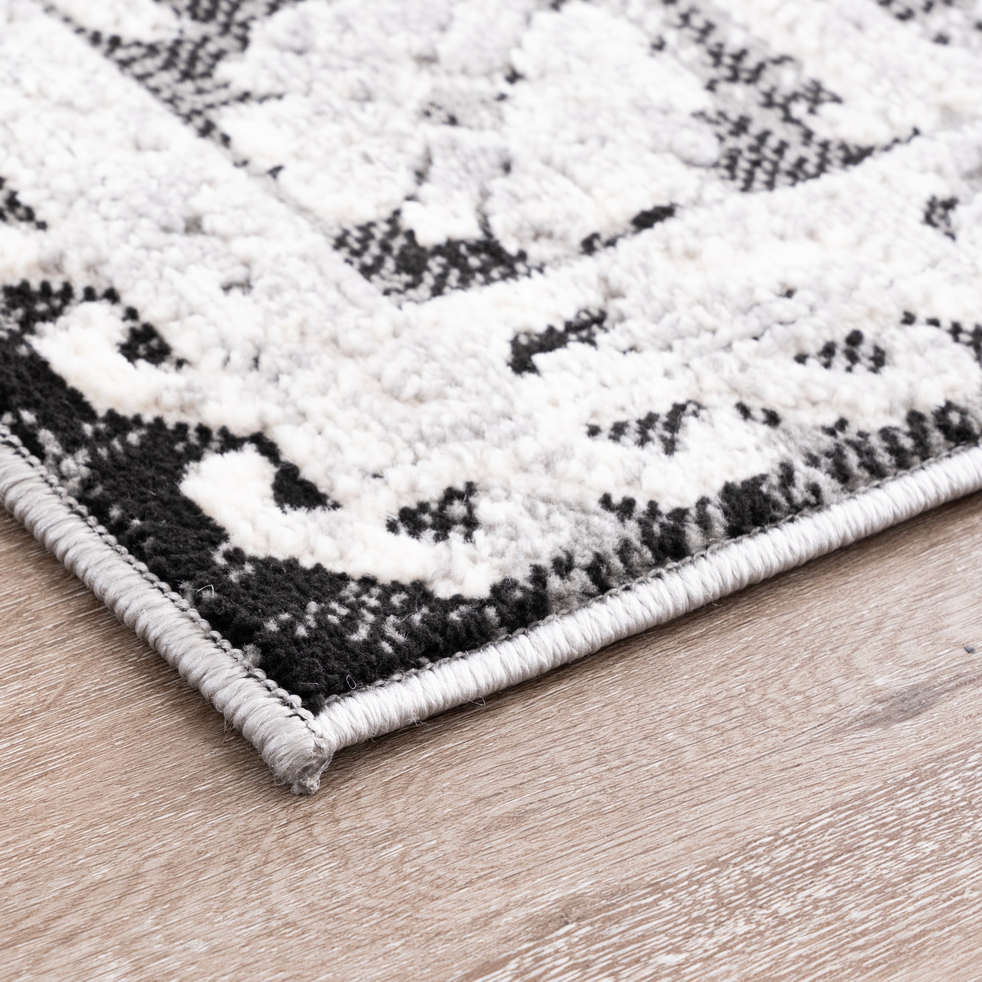 Alpha Transitional 8' x 10' Black and Gray Polyester Indoor Area Rug