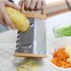 thumbnail image 3 of Rallador de caja de acero inoxidable, ralladores de queso y especias de 6 lados con asa, rebanar, triturar, rallar verduras, jengibre, papas, triturador de alimentos de mano, incluye recipiente, 3 of 5