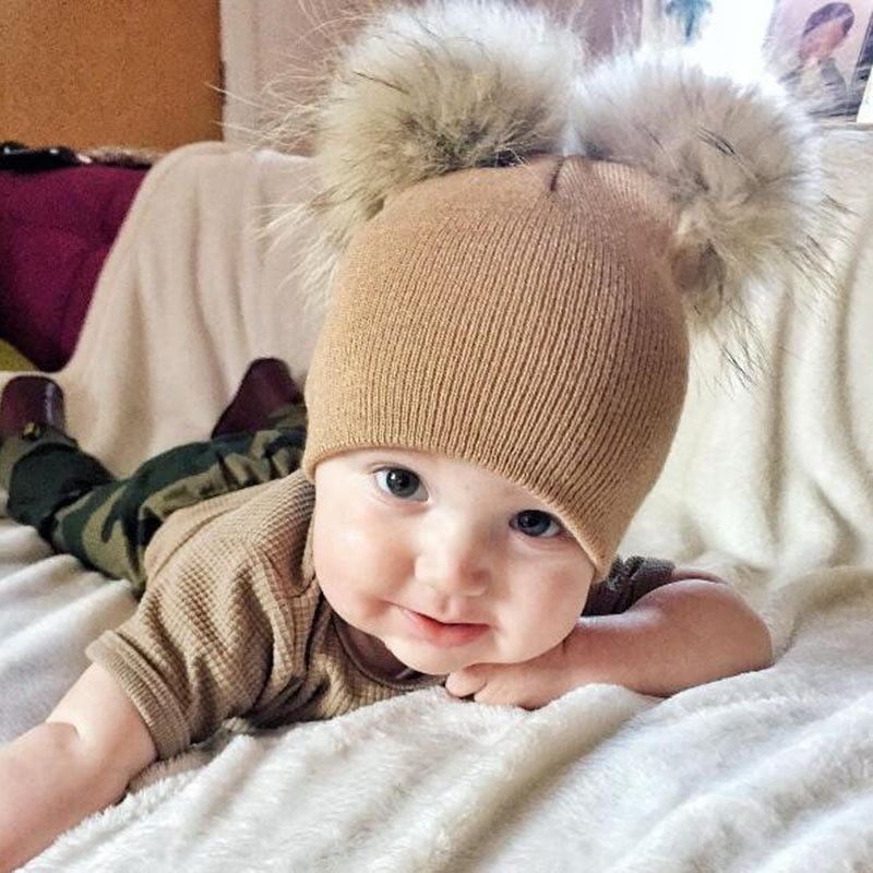 baby toques with pom pom