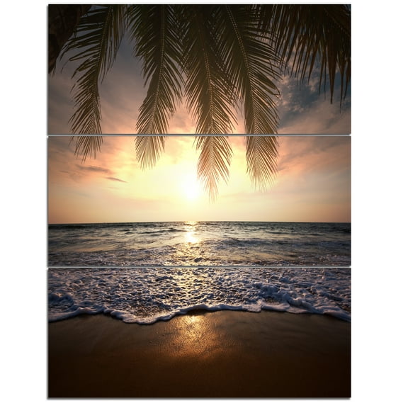 Designart 'Tropical Beach with Palm Leaves ' Seashore Canvas Art Print