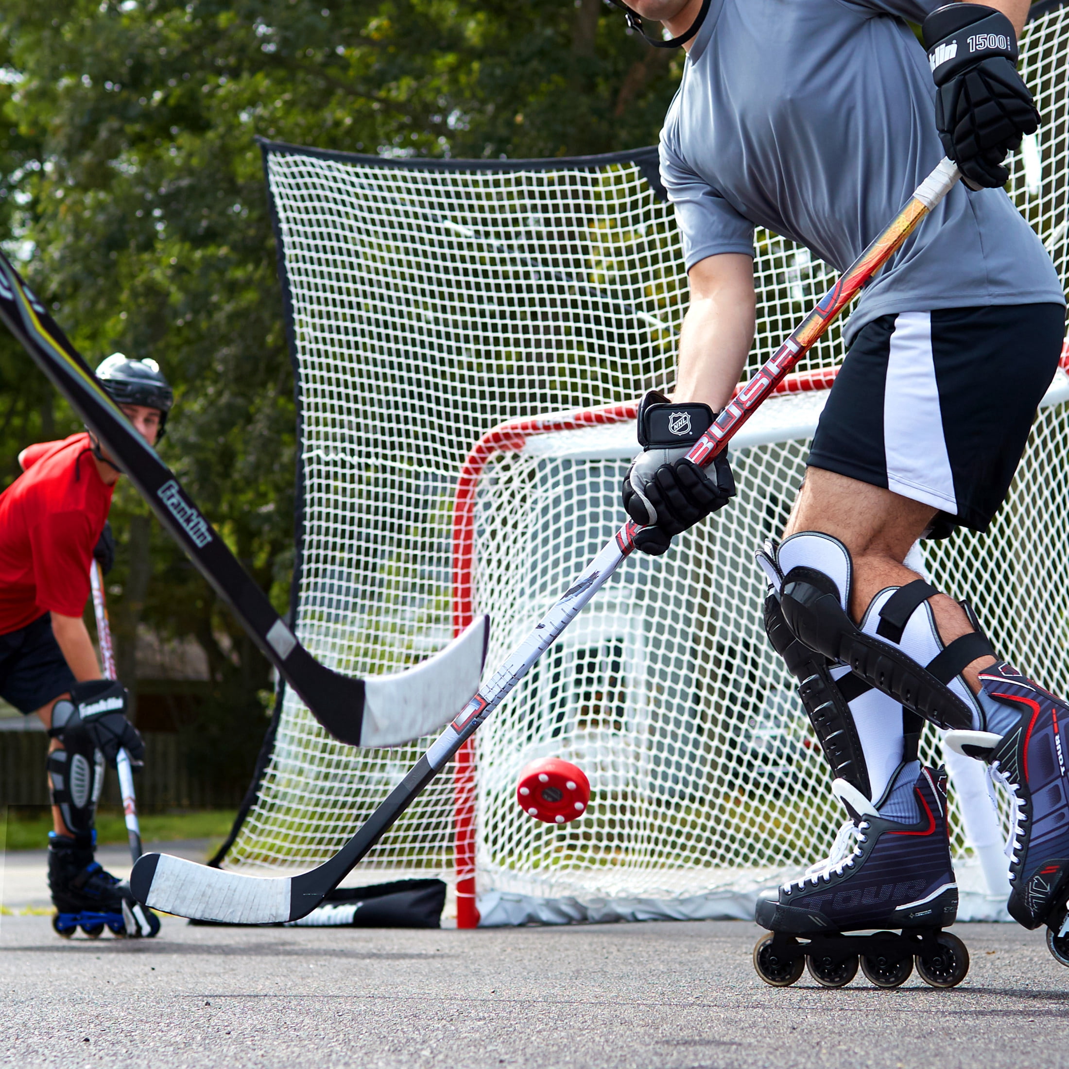 Franklin Sports NHL Street Roller Hockey Pucks - Pro Commander Outdoor Puck for Practice + Training - Red
