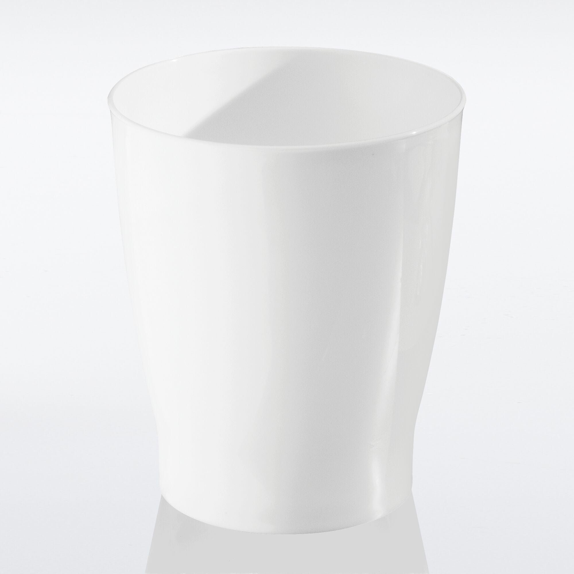 An Ode To A Plastic Urn: How A Small Trash Can Shapes Beauty