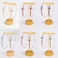 thumbnail image 2 of Joyería Pendiente de cruz dorada con diamantes, sencillo, personalidad exagerada, pendientes circulares, pendientes femeninos, uso versátil, estilo minimalista, 2 of 6