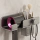 thumbnail image 1 of Organizador de pared plegable para secador de pelo | Capacidad de carga universal de 2 kg | Montaje adhesivo sin taladrar | Soporte para secador de pelo de baño que ahorra espacio con gancho, 1 of 5