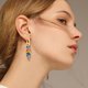 thumbnail image 4 of WILLBEST Pendientes Aretes De Estilo Étnico Con Esmalte De Gota De Aceite De Colores, Pendientes De Estrella De Cinco Puntas, Pendientes De Hojas Y Plumas Para Mujer, 4 of 5