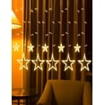 thumbnail image 1 of Luces 138 Led Cortina 12 Estrellas Decorativas 8 Modos Amarilla VIMI, 1 of 9