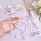 thumbnail image 3 of Llaveros de 6 estilos: llavero de platino con dijes y colgantes de perlas blancas, lazos de colores, llavero con clip y cuentas., 3 of 6