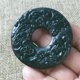 thumbnail image 1 of Jade pendant, made of black ink jade with openwork snake pattern, translucent green under light, magnetic jade., 1 of 4