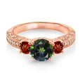 thumbnail image 2 of Gem Stone King 18K Rose Gold Plated Silver Green Mystic Topaz Red Garnet and White Moissanite Engagement Ring for Women (2.12 Cttw, Gemstone, Round 7MM and 4MM, Size 5), 2 of 3