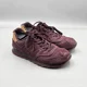 thumbnail image 1 of New Balance Men's Size 10 US 574 Molten Metal Maroon Metallic Gold Sneakers, 1 of 6