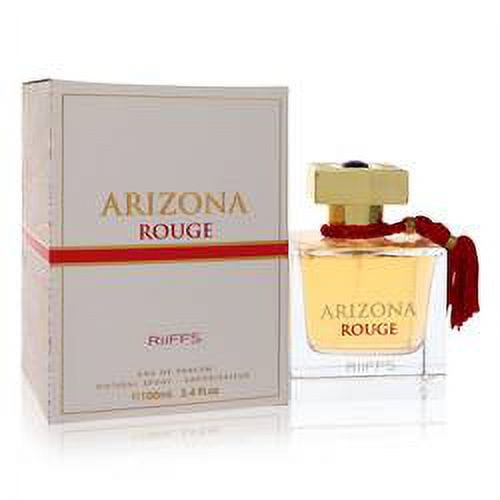 arizona rouge eau de parfum spray riiffs model frasco y caja frontales: frasco cuadrado de vidrio con esencia ámbar y etiqueta dorada 'ARIZONA ROUGE', tapón dorado con borla roja en el cuello; caja blanca con franja roja y texto dorado, presentación 100 ml.