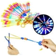 thumbnail image 1 of Juguetes voladores de helicóptero, 15 piezas de helicóptero ligero volador LED Catapult Heli Launcher Elastic Powered Sling Shot - Múltiples estilos Namotu LN-2050, 1 of 7