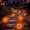 Orange, variant on Solar Lights Outdoor Waterproof,Orange 12 Pack 2-in-1 Ground Lights | Halloween Lights Outdoor Solar Disk Light Landscape Light for Deck Step Patio Yard Pathway Walkway Driveway Garden