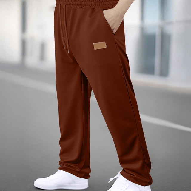 Pantalones largos para hombre, lisos, a la moda, informales, con bolsillos, cintura elástica, pantalones deportivos largos de poliéster para hombre.