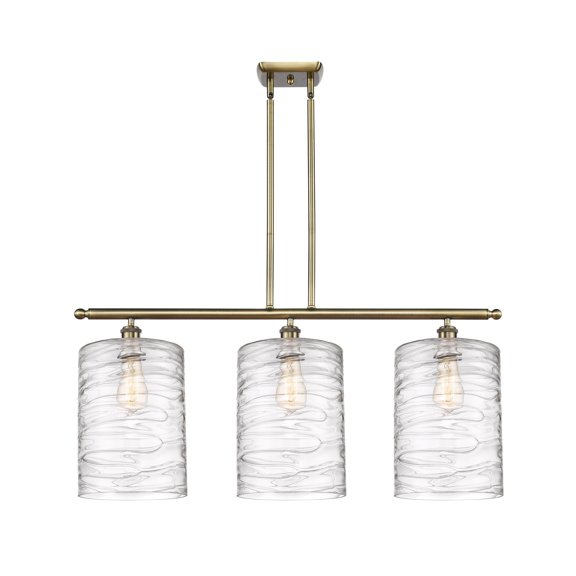 Innovations Lighting Cobbleskill - 3 Light 36" Island Light Antique Brass/Deco Swirl